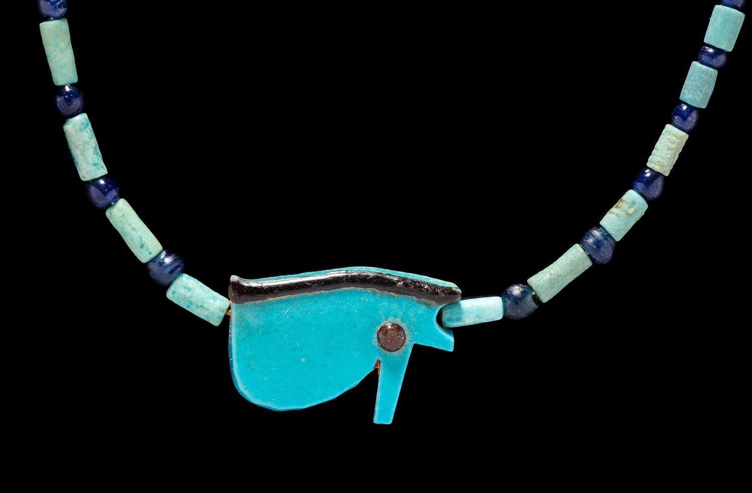 An Egyptian Faience and Blue Glass Bead Necklace