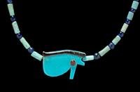 An Egyptian Faience and Blue Glass Bead Necklace