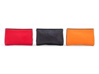 Three Hermès Leather Karo Trousse Cosmetic Bags, 2000-2013