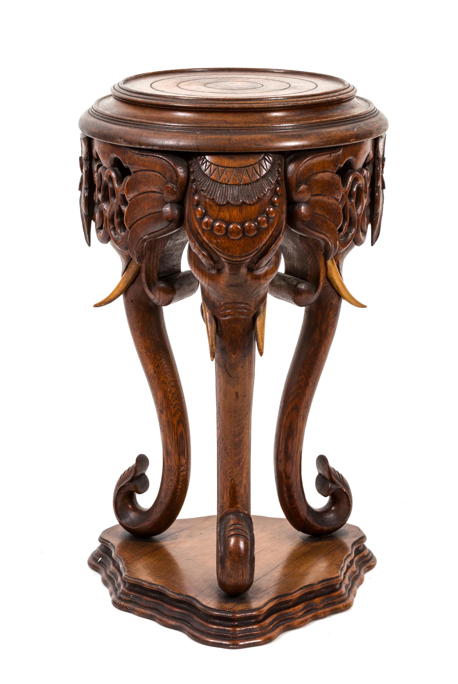 An Anglo-Indian Carved Oak Pedestal Table Height 39 x diameter 15 1/2 inches. — 20TH CENTURY