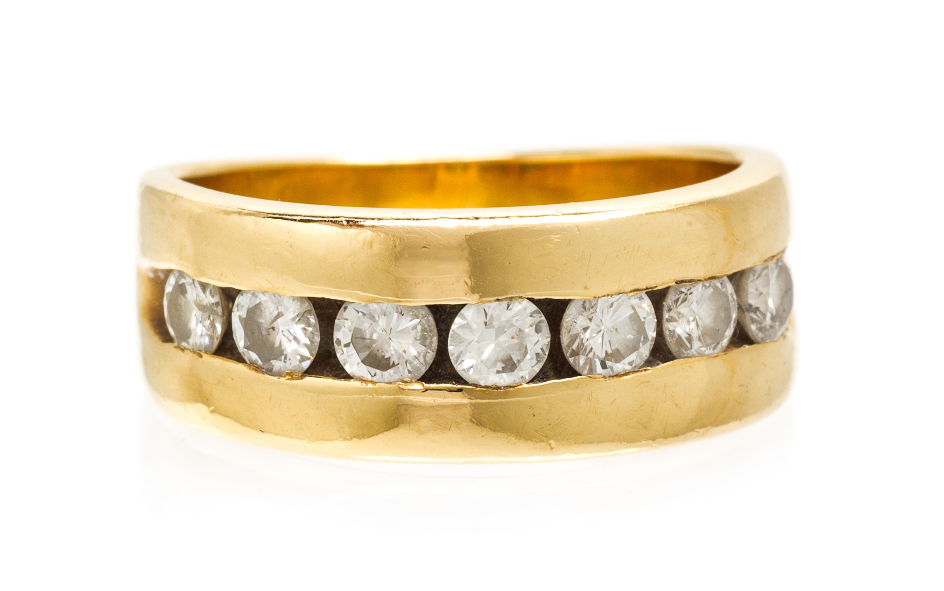 A 14 Karat Yellow Gold and Diamond Ring, 3.70 dwts.