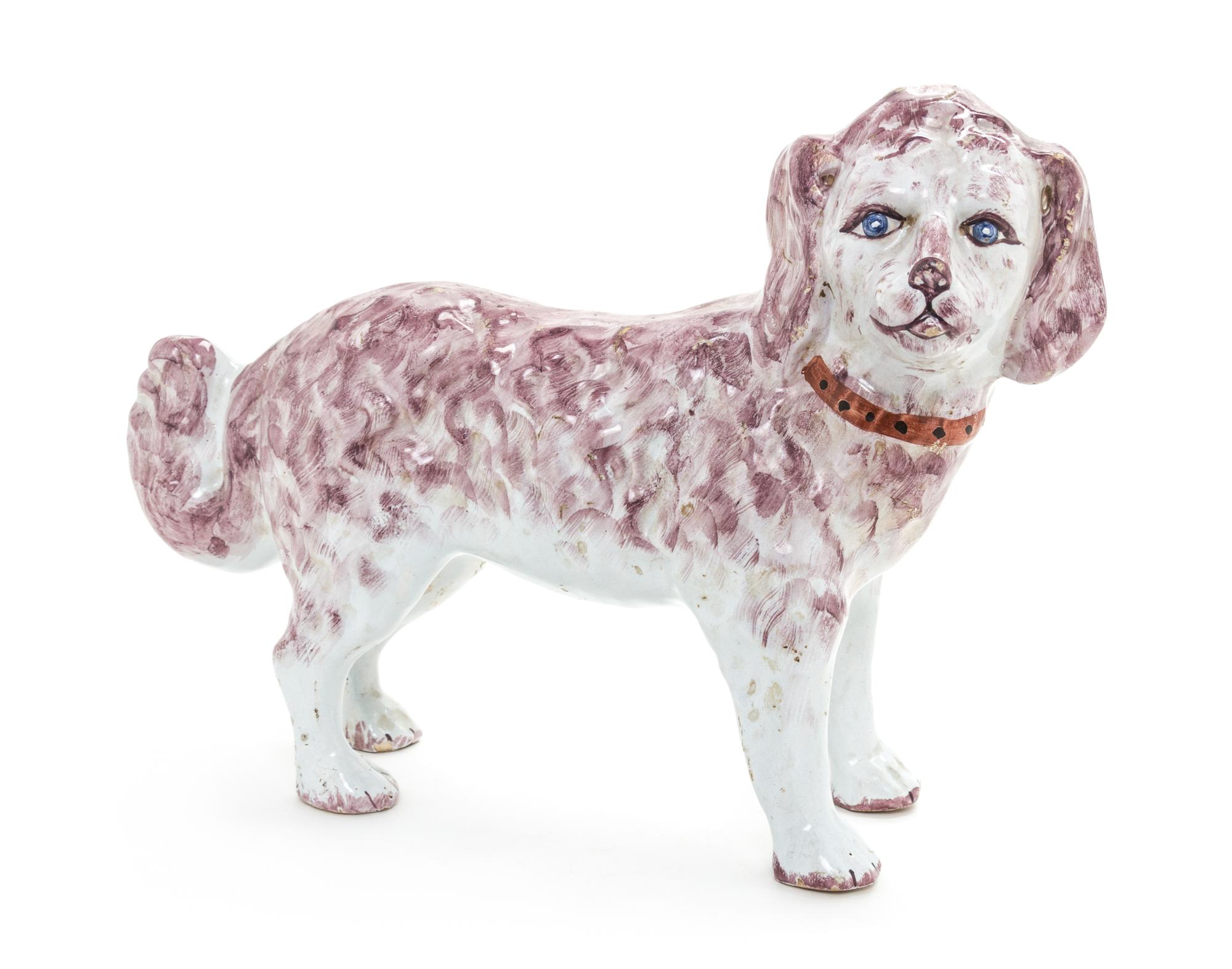 A Delft Pottery Model of a Dog Width 14 1/2 inches.