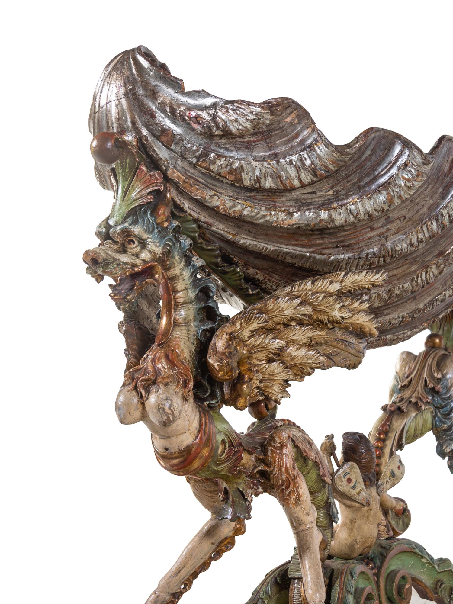 A Venetian Figural Carved and Polychrome Decorated Wood Cradle