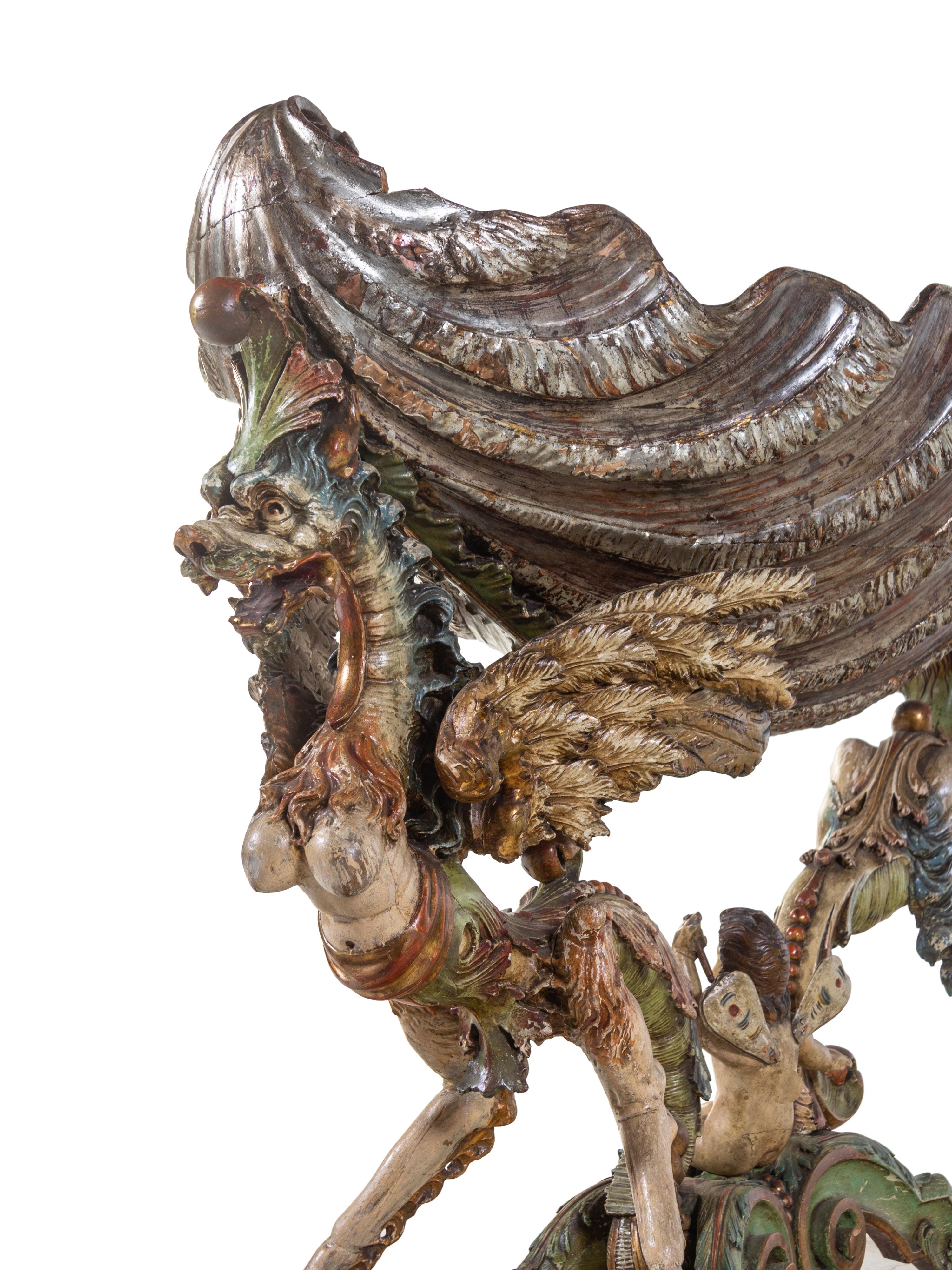 A Venetian Figural Carved and Polychrome Decorated Wood Cradle