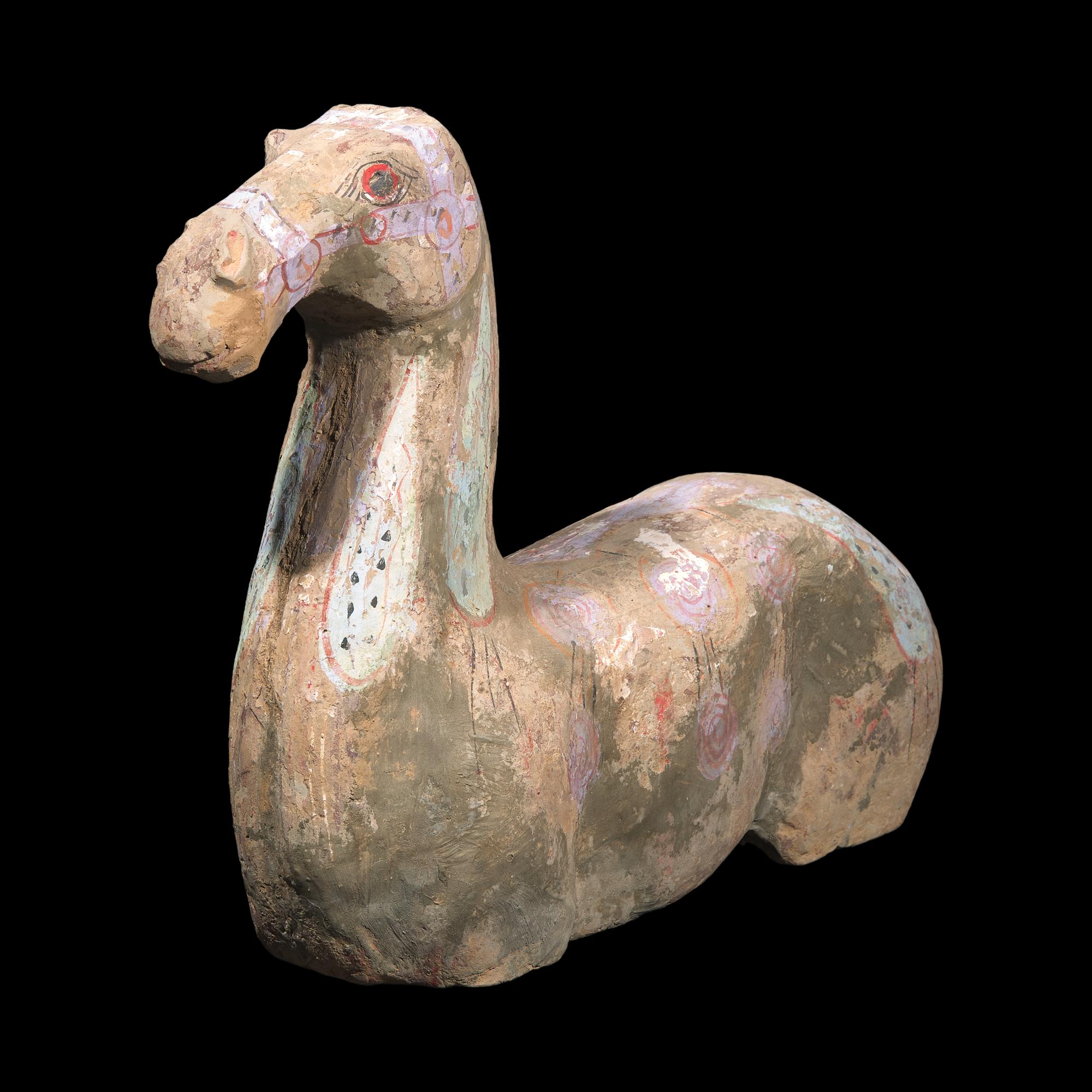 A Chinese Painted Grey Pottery Figure of Recumbent Horse, Han Dynasty 漢 彩繪灰陶馬