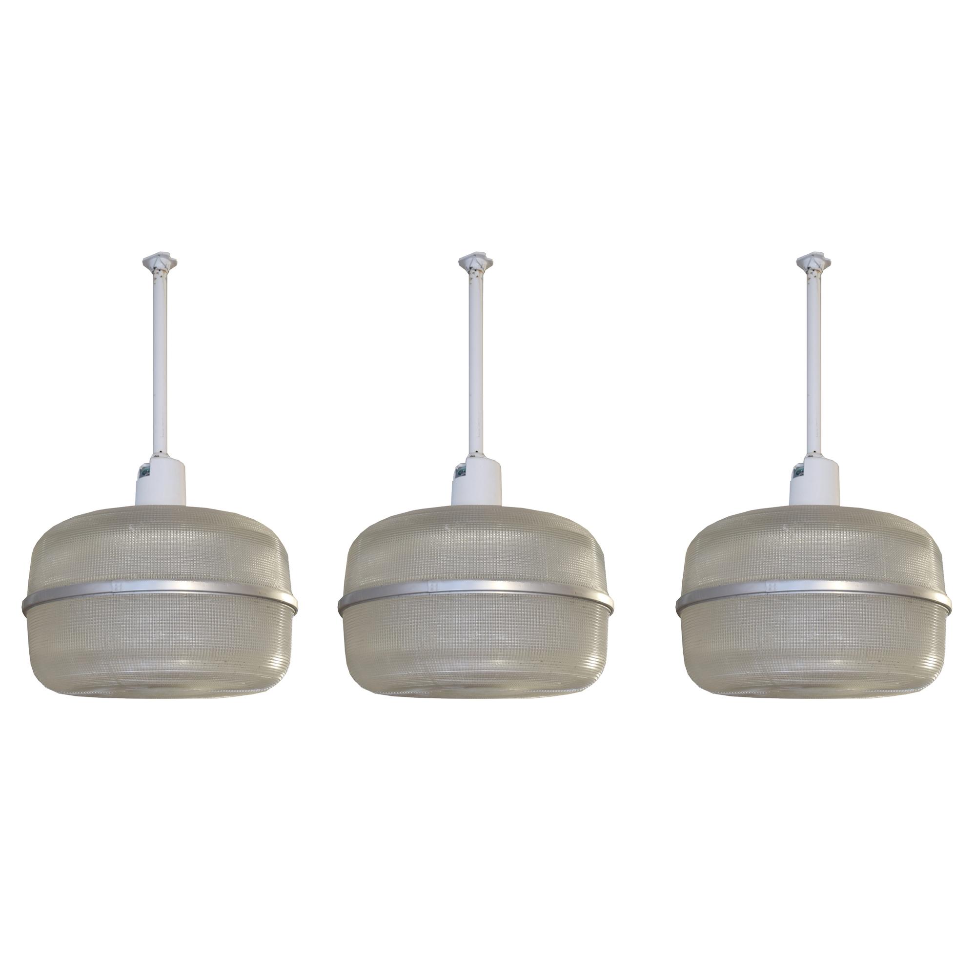 A Set of Three American Industrial Holophane Light Fixtures 18" W x 18" D x 33" H — United States, Circa 1930