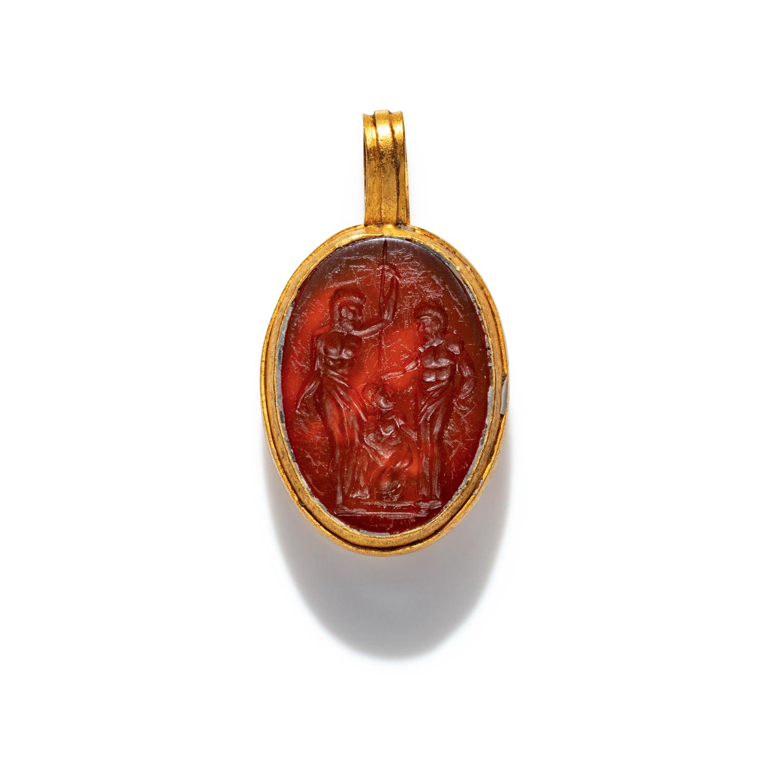 A Carnelian and Gold Pendant with an Erotic Scene