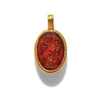A Carnelian and Gold Pendant with an Erotic Scene