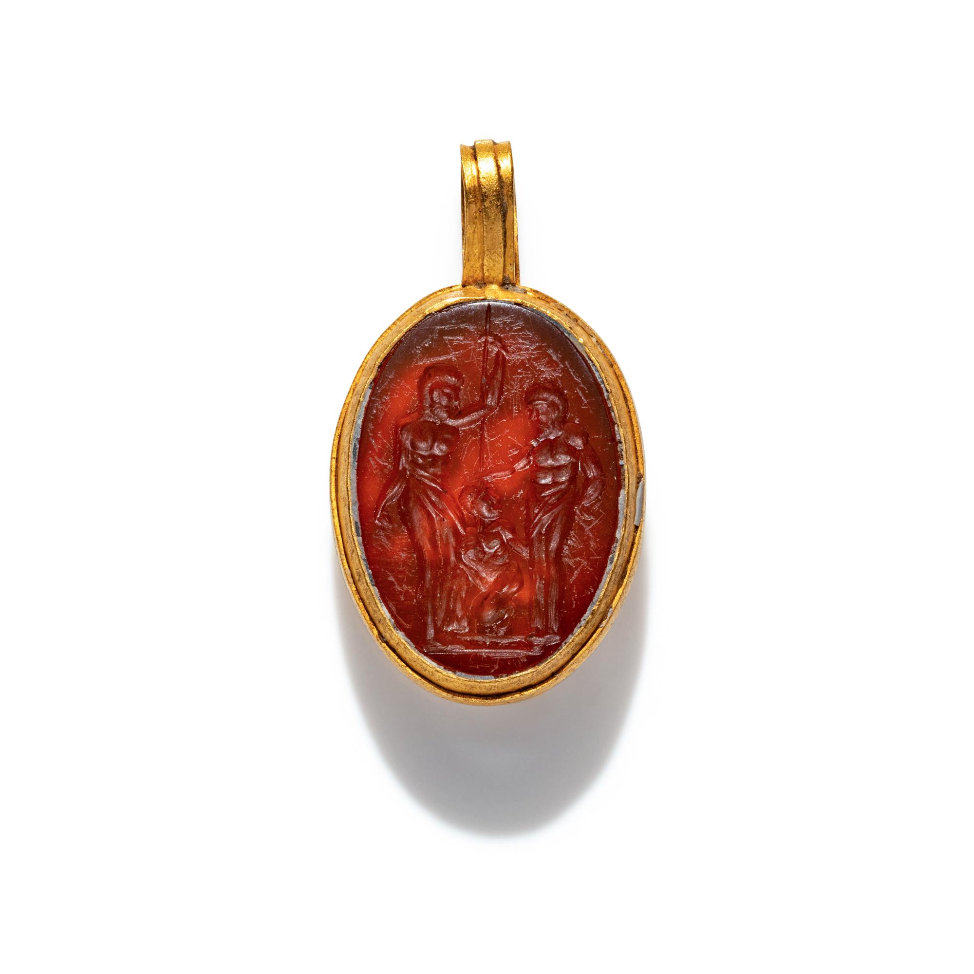A Carnelian and Gold Pendant with an Erotic Scene