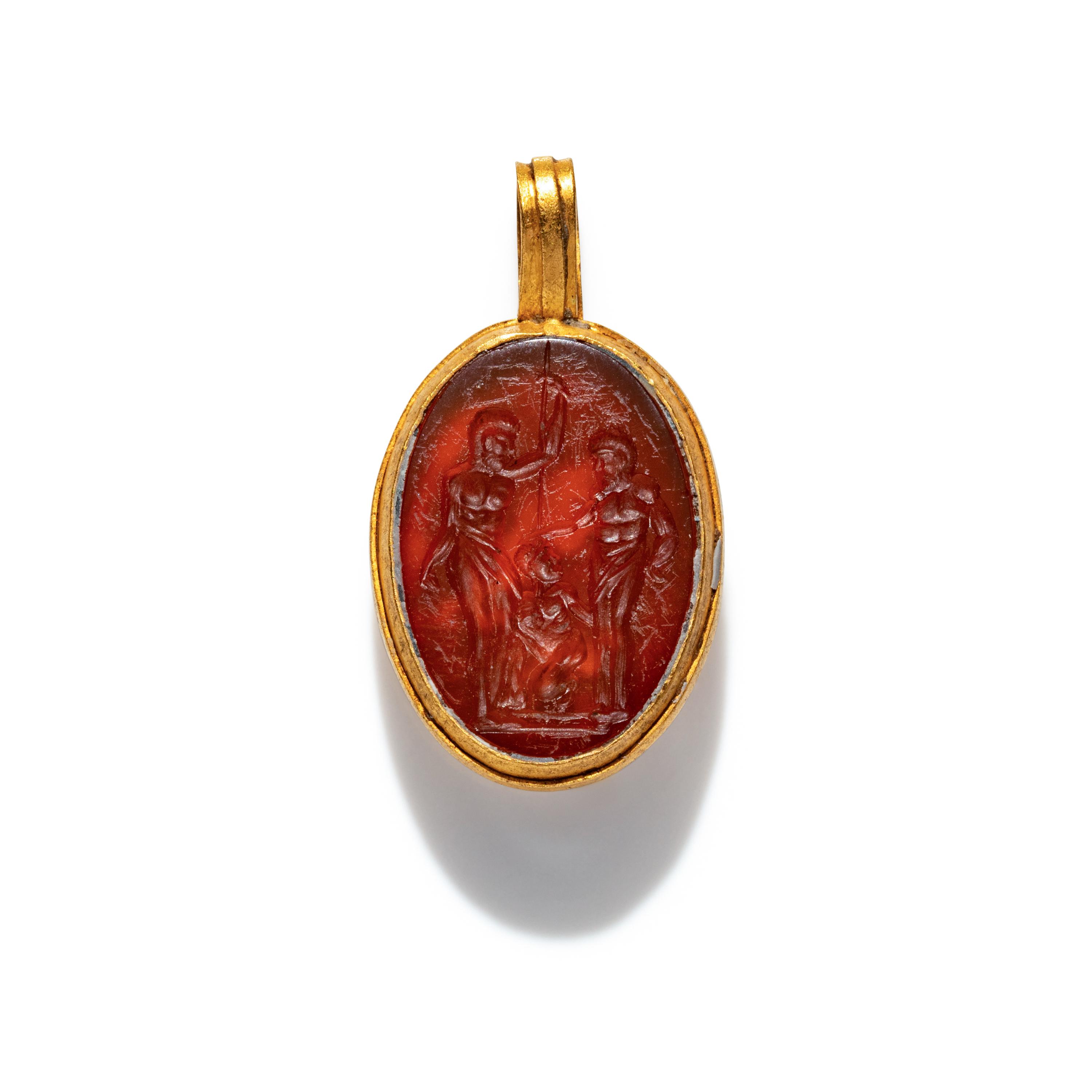 A Carnelian and Gold Pendant with an Erotic Scene