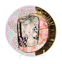 A Collection of Laney K. Oxman Ceramic Dinnerware Articles