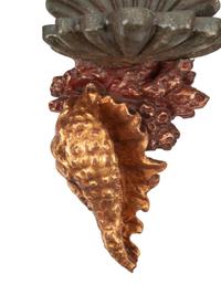 A Set of Four Italian Carved, Painted and Parcel Gilt "Grotto" Style Wall Brackets