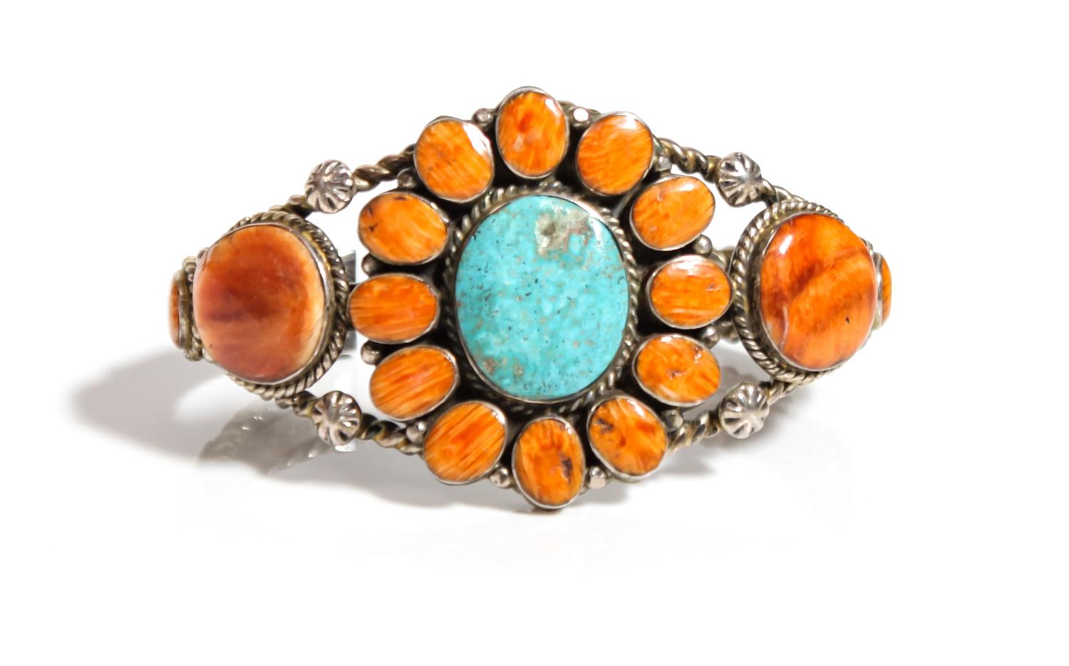 A Southwestern Silver, Turquoise and Spiney Oyster Cuff Bracelet Length 5 1/2 x opening 1 3/8 x width 1 5/8 inches.