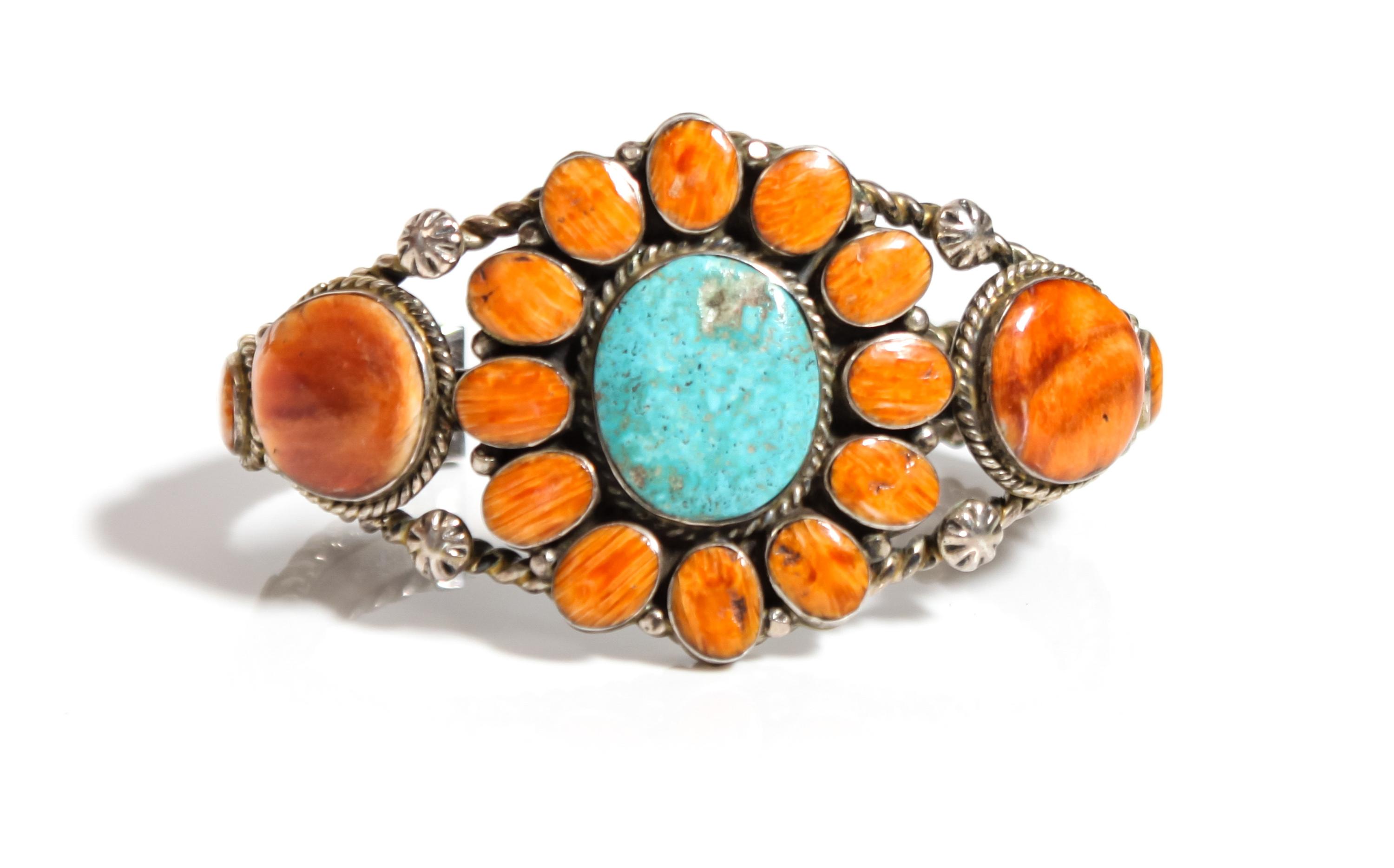A Southwestern Silver, Turquoise and Spiney Oyster Cuff Bracelet Length 5 1/2 x opening 1 3/8 x width 1 5/8 inches.