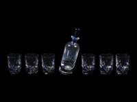 A Thomas Bastide for Baccarat Cut Glass Projection Decanter and Rocks Glass Set