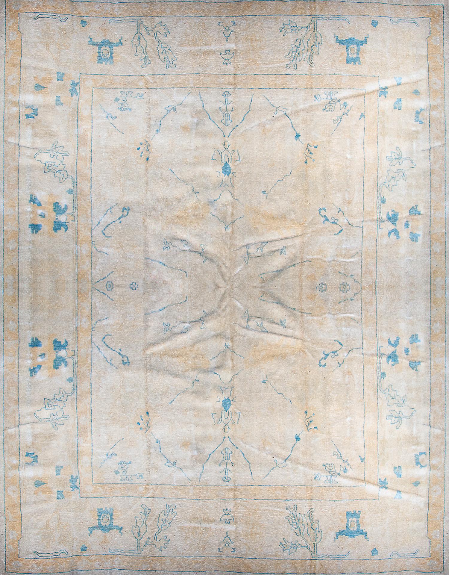 An Oushak Rug. 10 feet x 13 feet 7 inches.