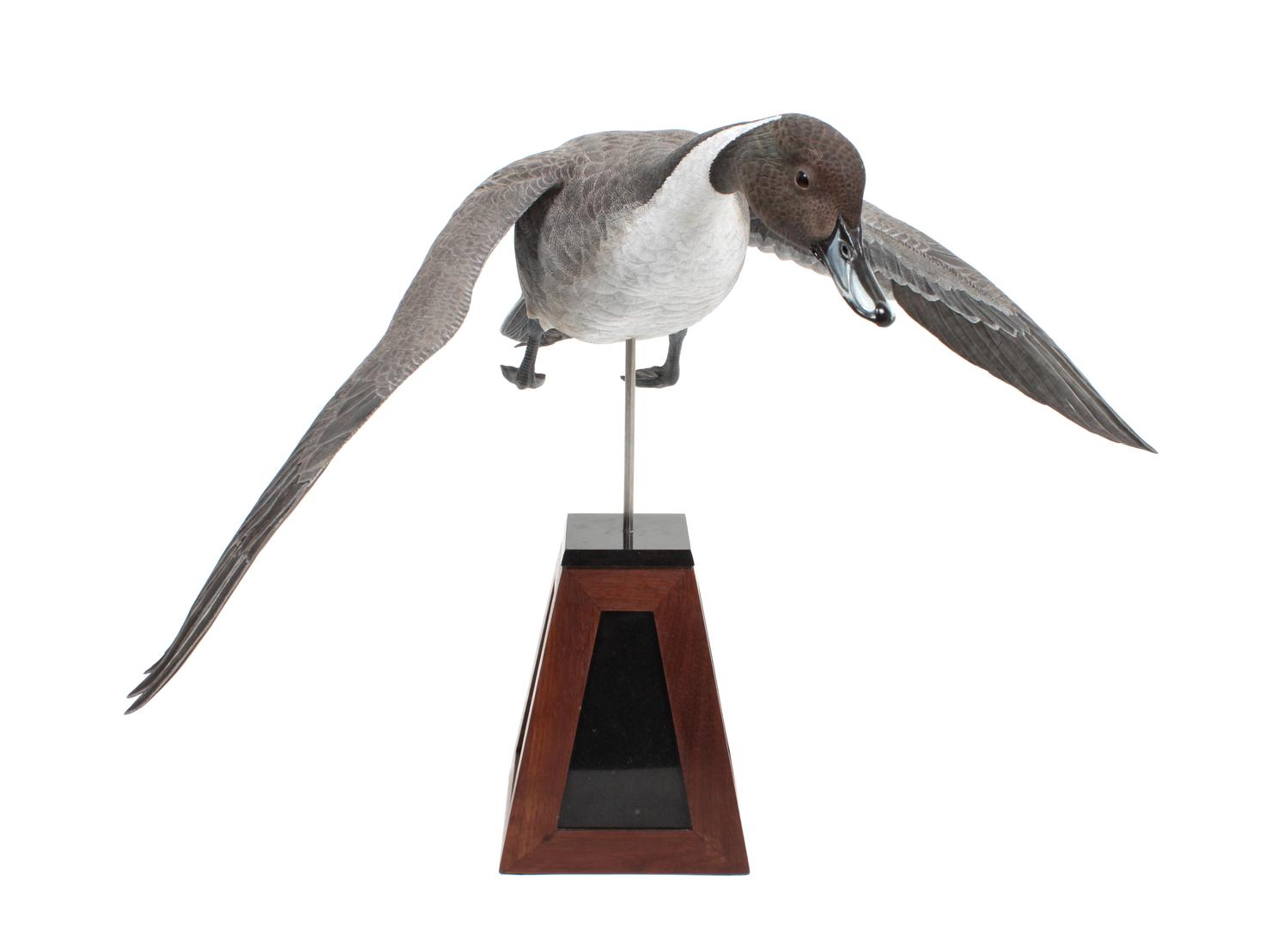 A Hand Carved and Painted Wood Sculpture, Ward E. Hermann (American, 1936-2009) Height 18 1/2 x width 25 inches (with base)