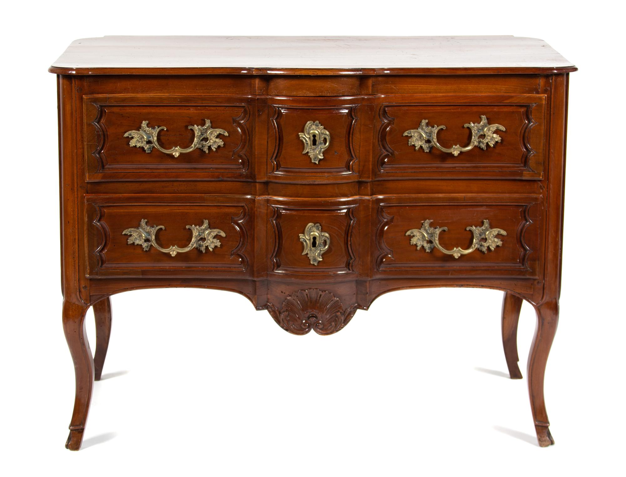 A Louis XV Provincial Style Carved Fruitwood Commode Height 33 x width 45 x depth 22 3/4 inches. — INCORPORATING ANTIQUE ELEMENTS