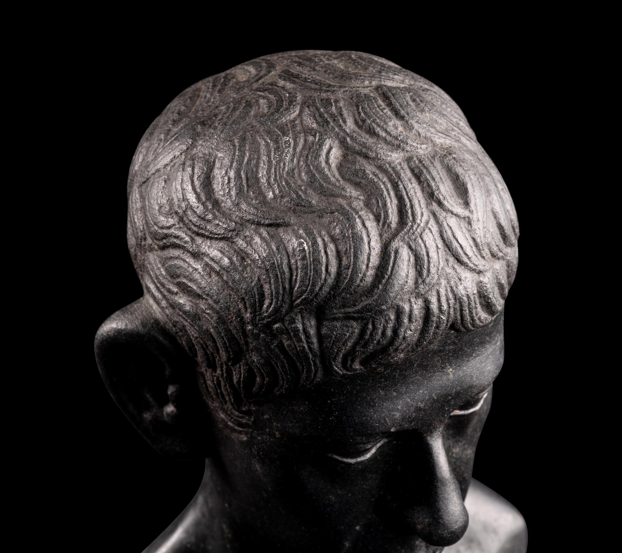 A Romano-Egyptian Black Basalt Male Portrait Bust