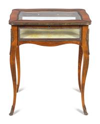 A Louis XV Style Gilt Metal Mounted Walnut Vitrine Table