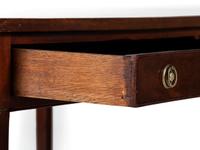 A Regency Mahogany and Leather Inset Writing Table