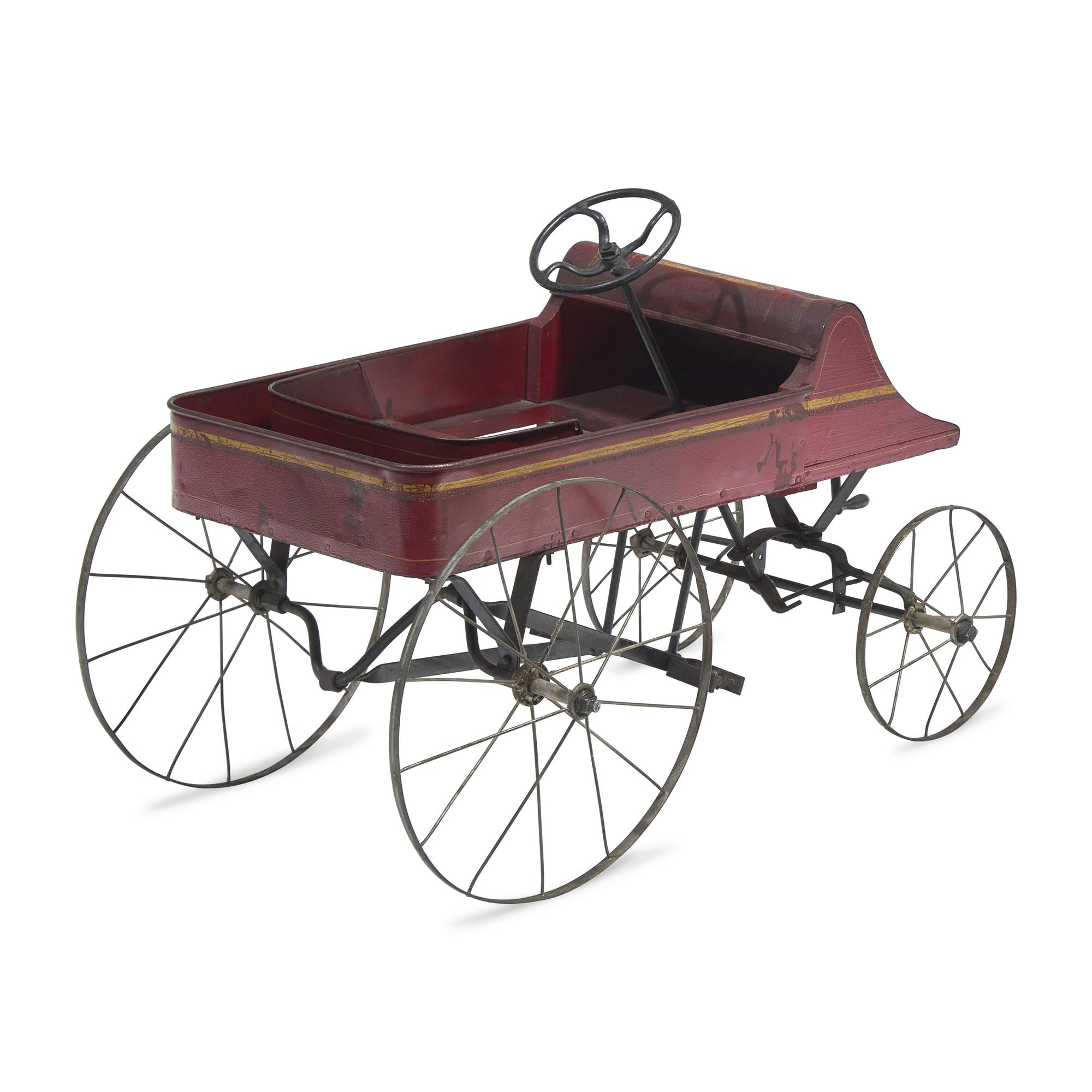A Painted Tin Pedal Car