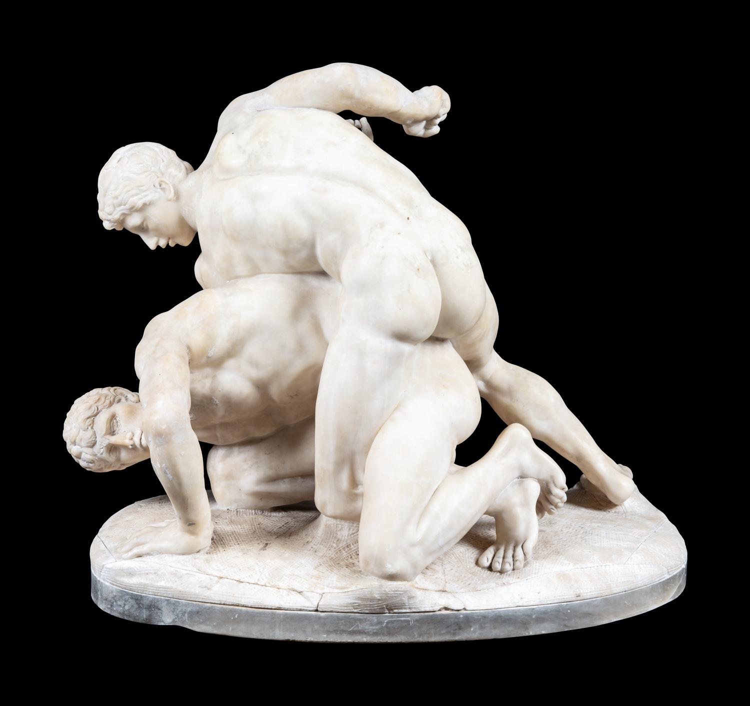 A Carved Alabaster Figural Group of The Wrestlers After the Antique