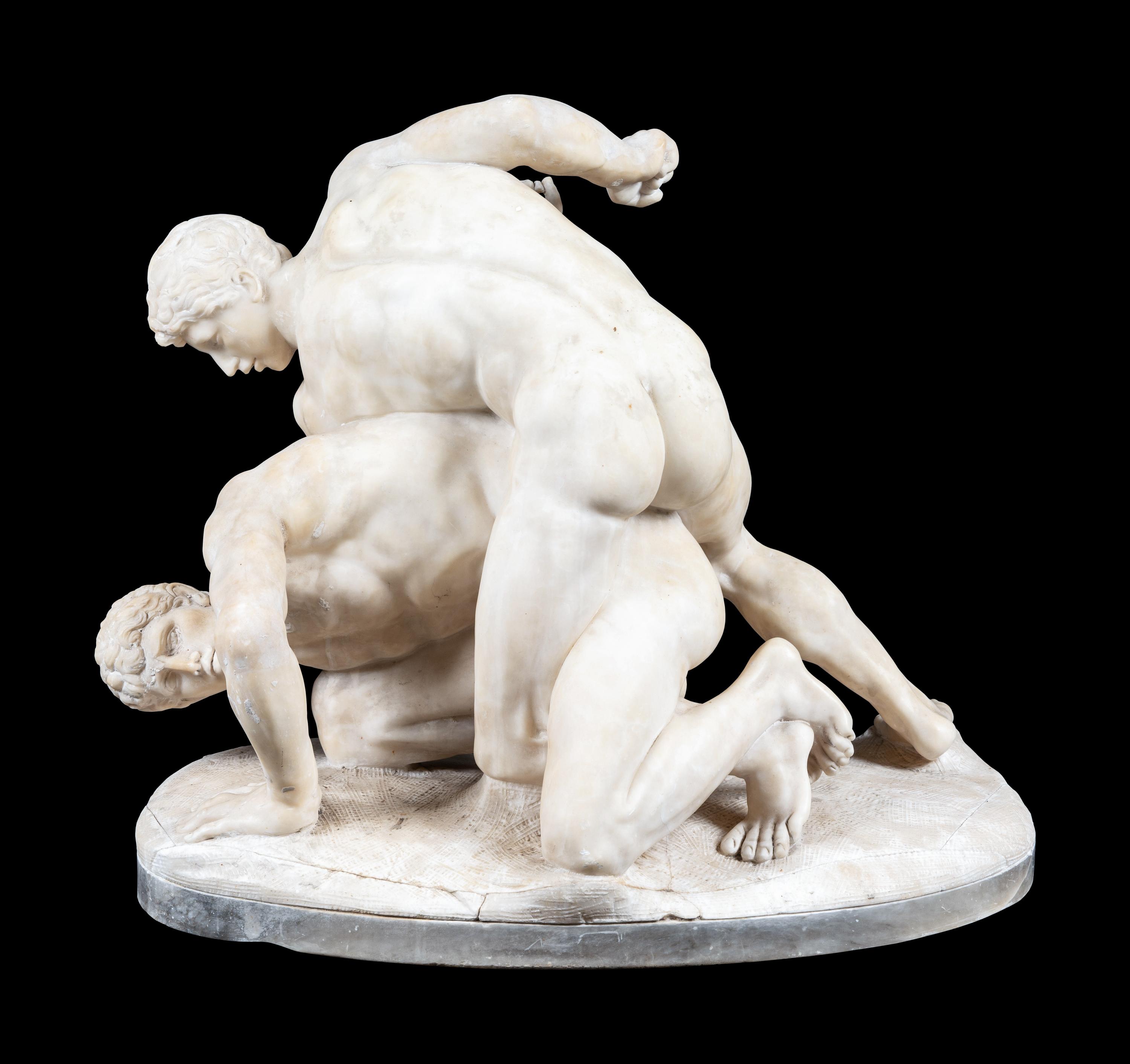 A Carved Alabaster Figural Group of The Wrestlers After the Antique