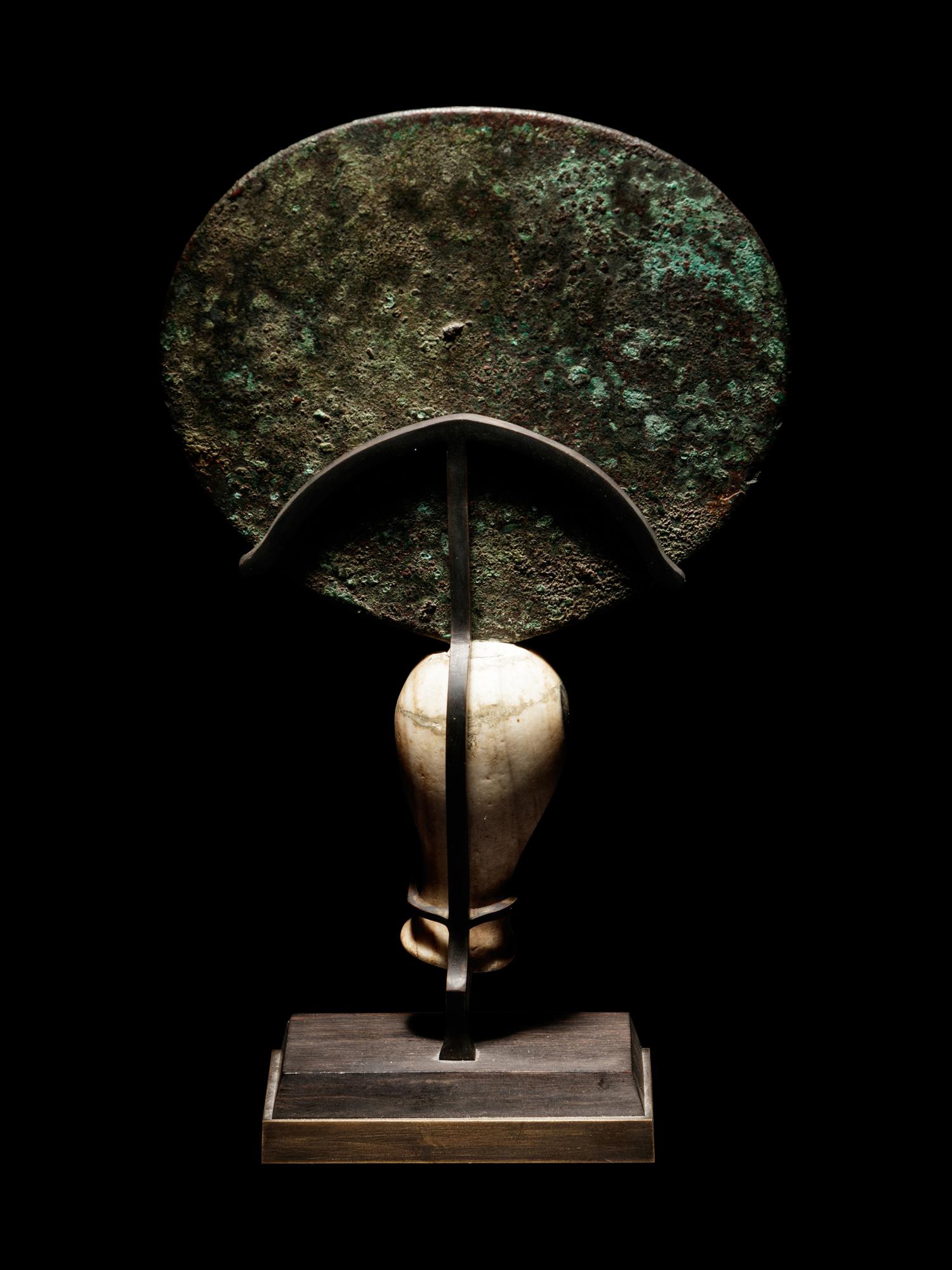 An Egyptian Bronze Mirror