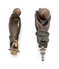 A Pair of Bronze Hand-and-Ball Door Knockers