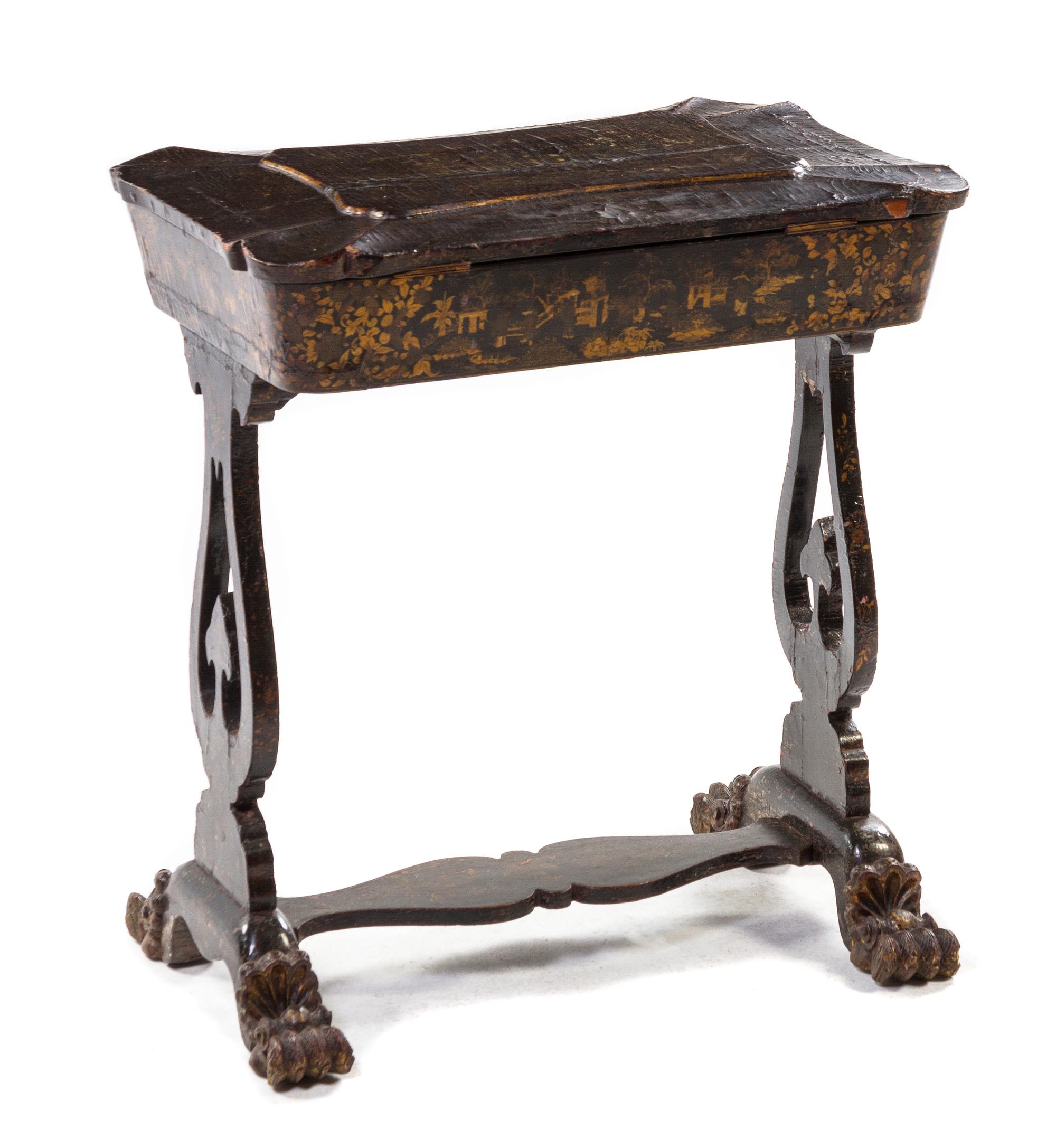 A Regency Lacquered Work Table, Height 28 1/2 x width 25 1/2 x depth 17 inches.