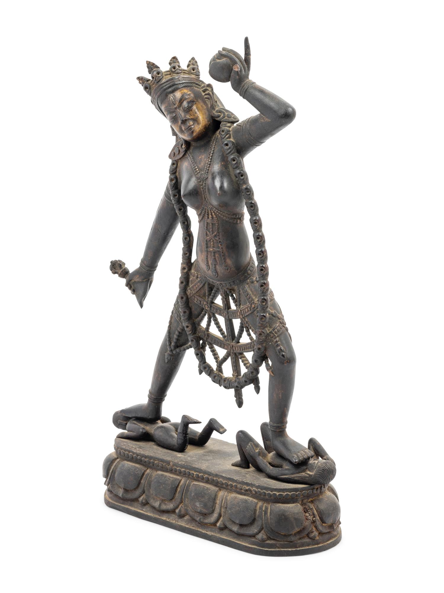 A Tibetan Lacquered Wood Figure of Vajrayogini