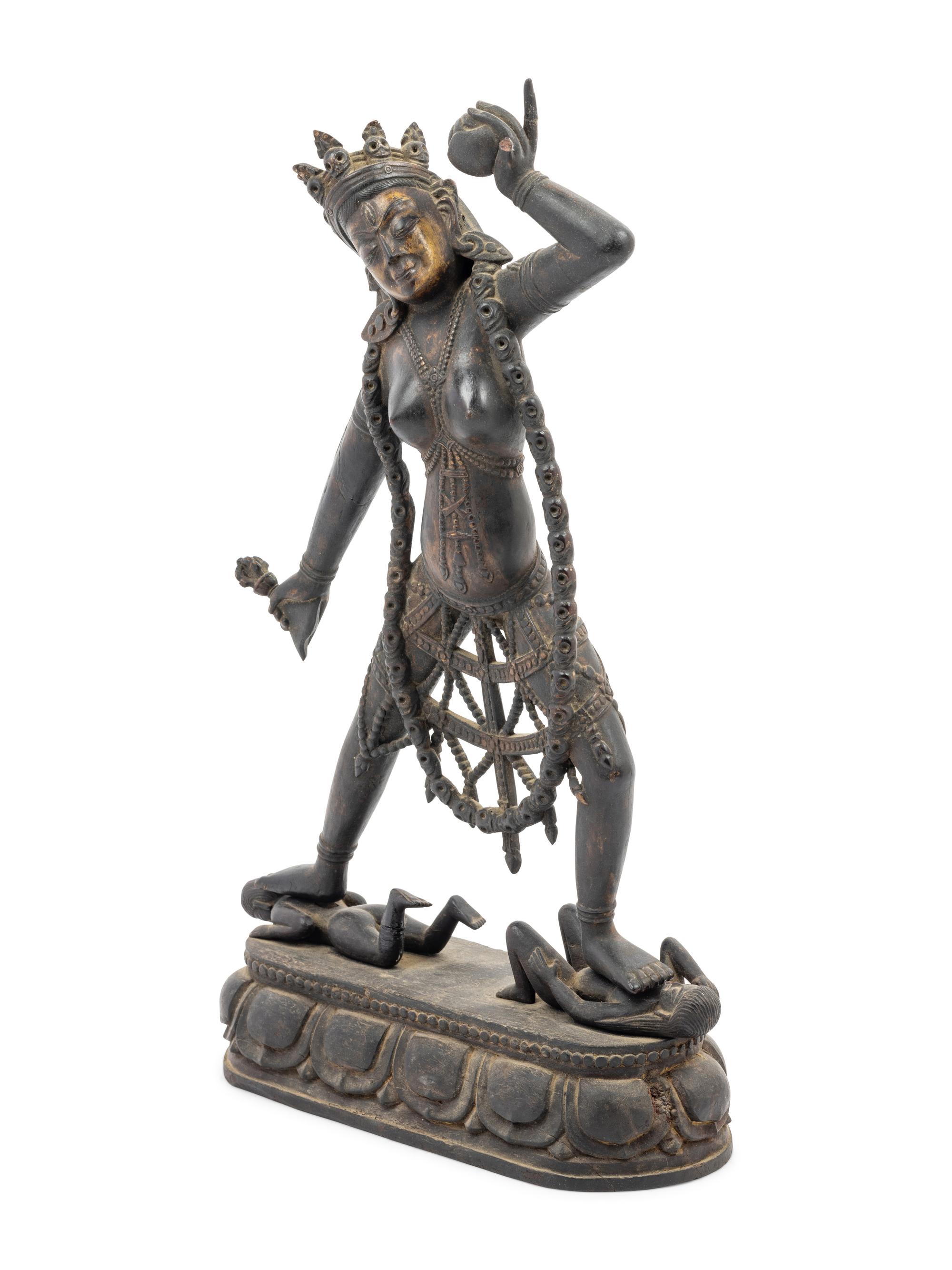 A Tibetan Lacquered Wood Figure of Vajrayogini