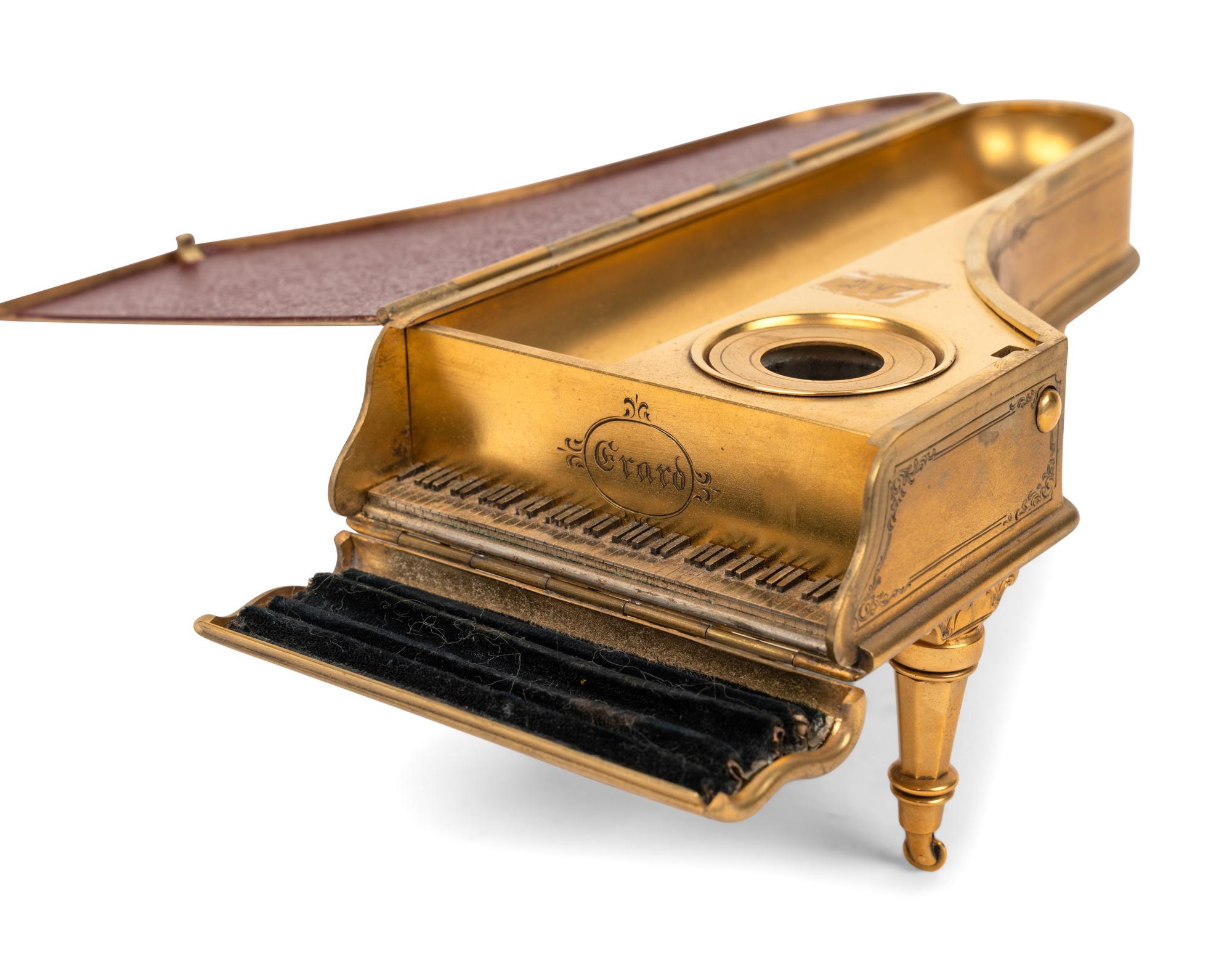 Two Piano-Form Inkwells and an English Silver Letterbox Inkwell