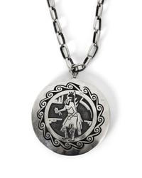 A Hopi Silver Overlay Two Sided "Spinner" Pendant Diameter 2 1/2 inches, length of chain 25 inches.