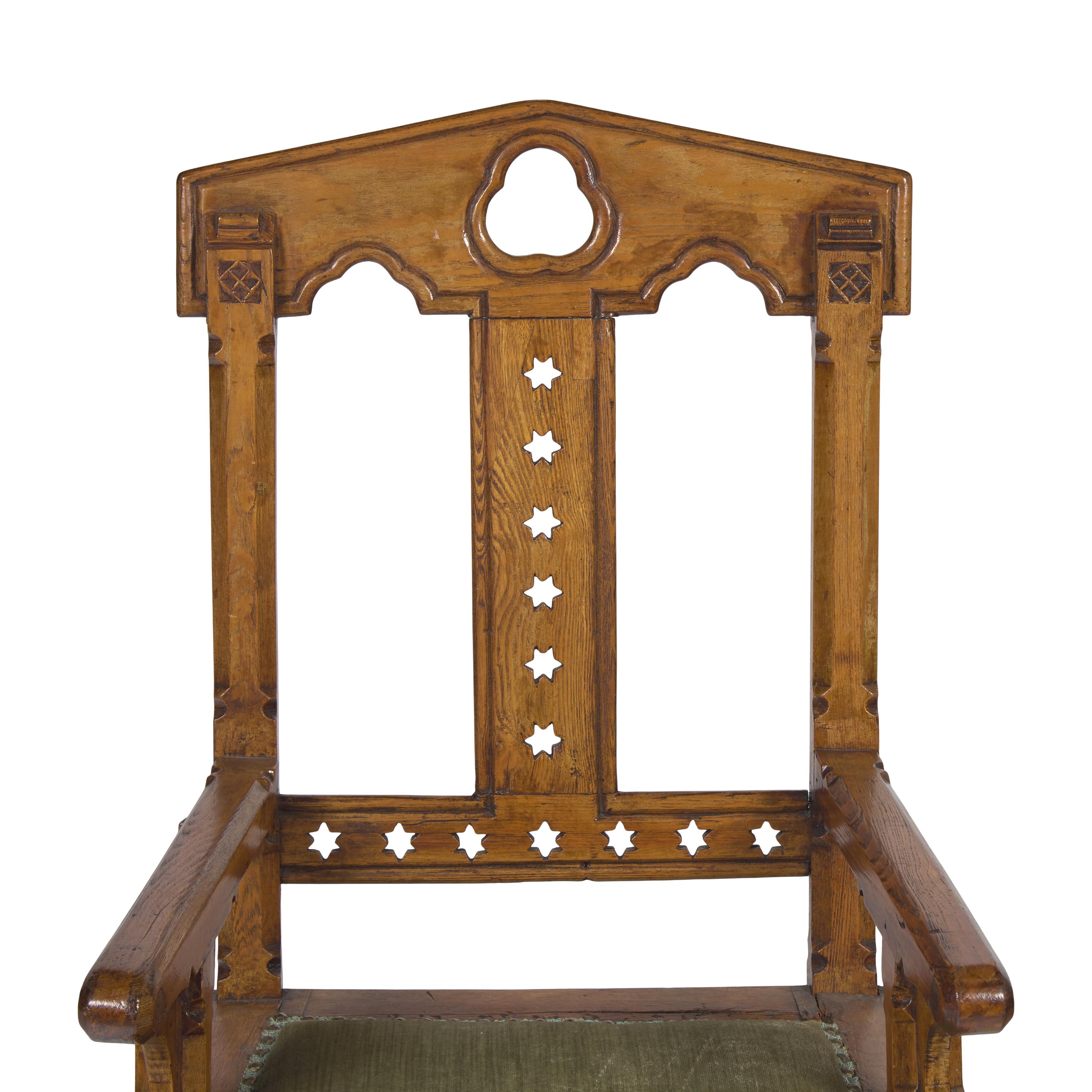 A Gothic Revival Patent Gothic Star Walnut Arm Chair