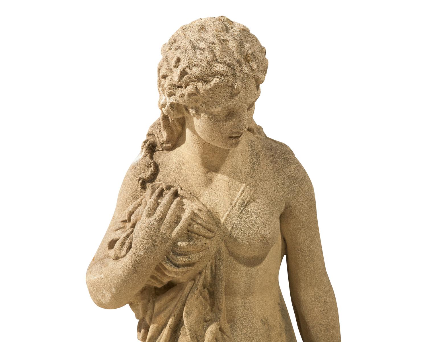 A cast stone / concrete statue of an enchained nereid, early 20th century