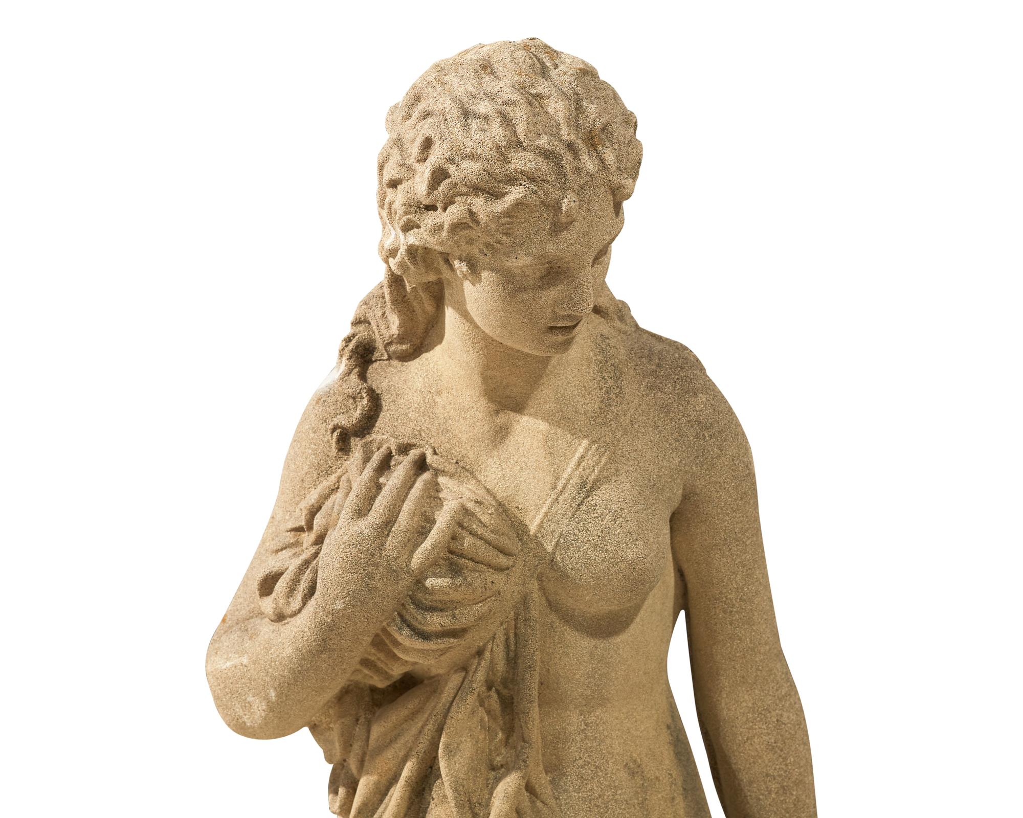 A cast stone / concrete statue of an enchained nereid, early 20th century
