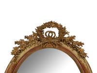 A Napoleon III Giltwood Oval Mirror