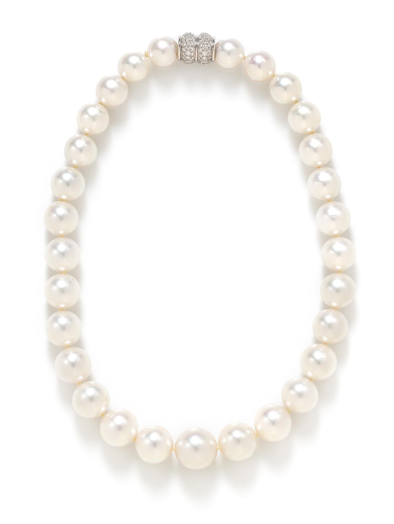 A White Gold, Diamond and Graduated Cultured South Sea Pearl Necklace,