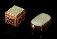 Two Carved Jade Plaques Length of larger 2 1/2 inches.