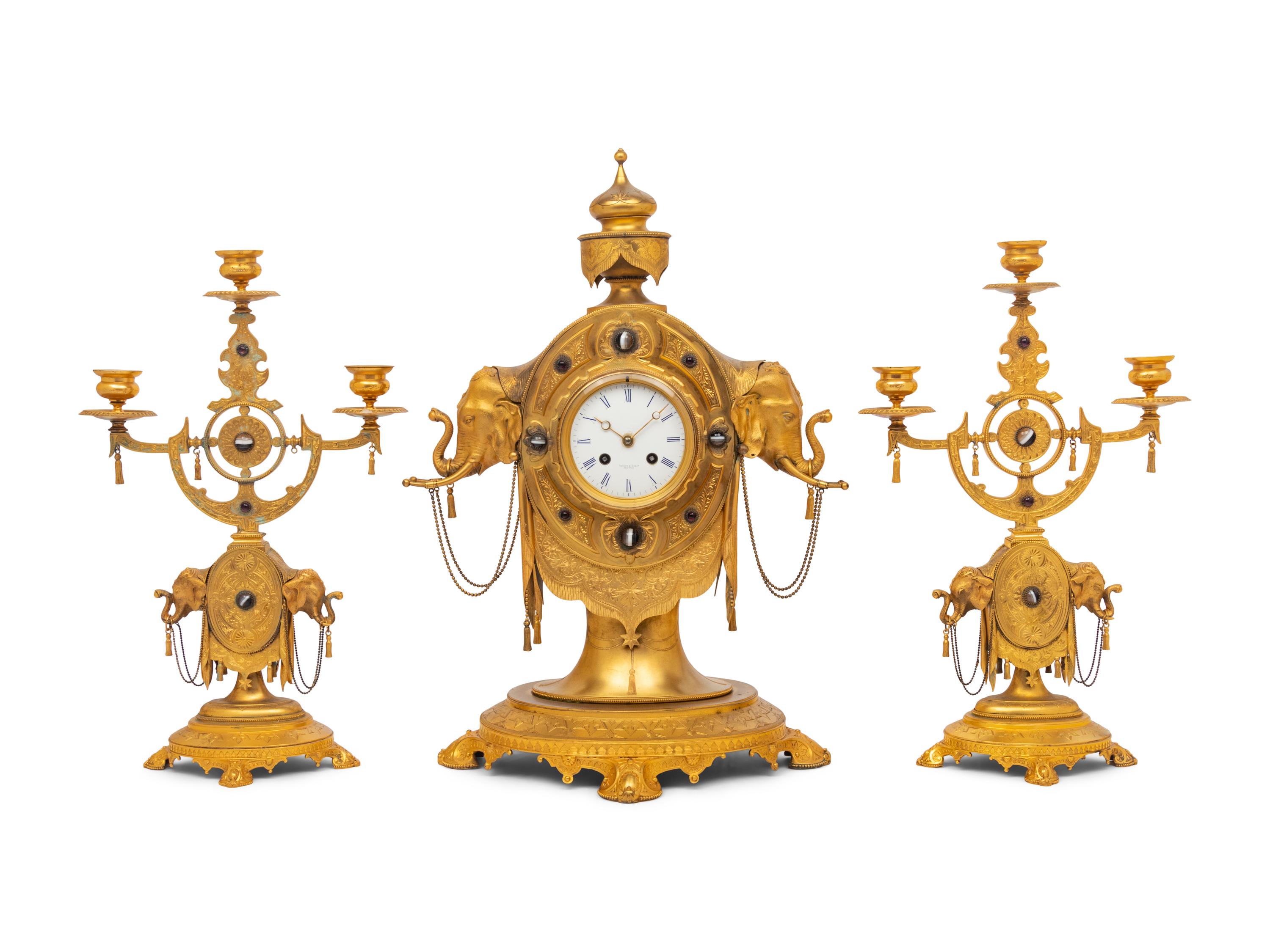 An English Orientalist Gilt Bronze Three-Piece Clock Garniture