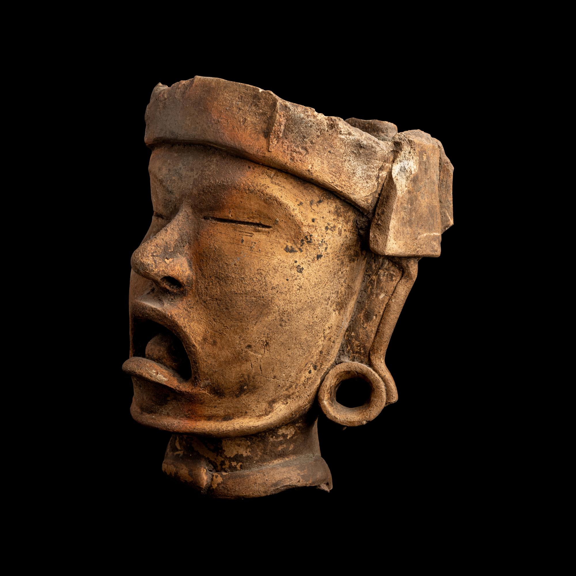 A Vercruz Terracotta Head of Xipe Totec