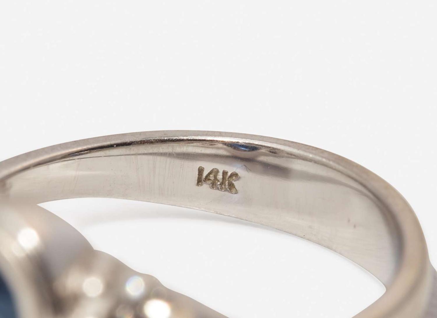 A White Gold, Sapphire, and Diamond Ring