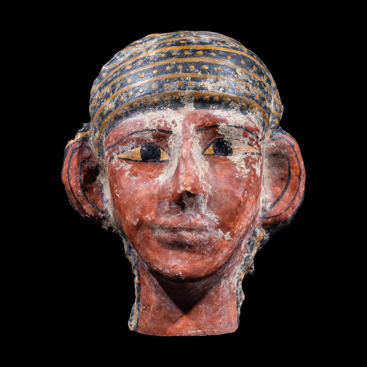 An Egyptian Cartonnage Mummy Mask