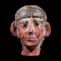 An Egyptian Cartonnage Mummy Mask