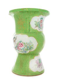 A Gilt Decorated Green Ground Famille Rose Porcelain Spittoon Height 14 3/4 inches. — LATE 19/EARLY 20TH CENTURY