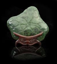 A Spinach Jade Brush Washer Width 4 1/8 inches.