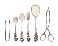 A Group of Continental Silver Flatware, , each with an entwined branch form handle and a rose terminal, comprising: 6 fish forks 6 teas