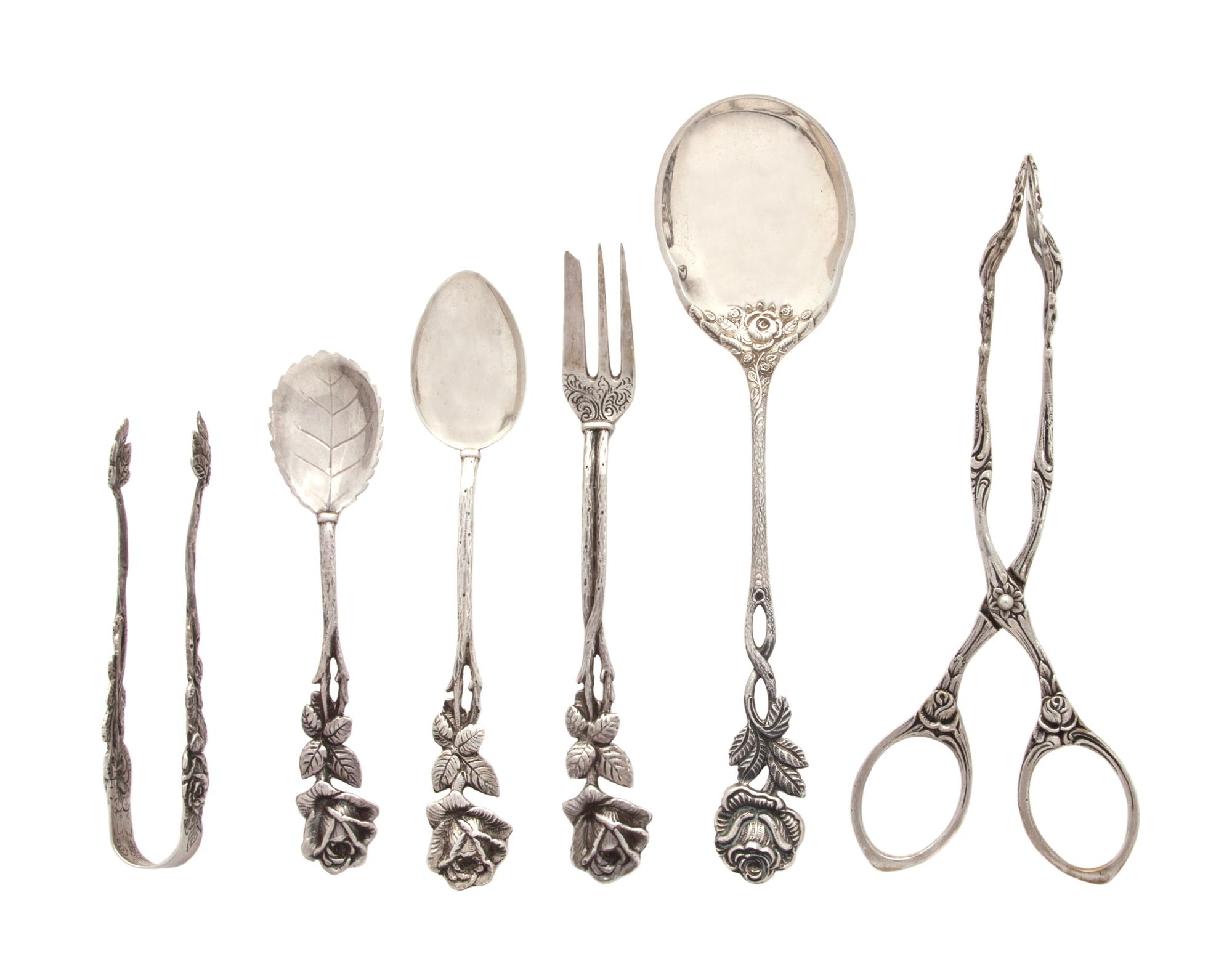 A Group of Continental Silver Flatware, , each with an entwined branch form handle and a rose terminal, comprising: 6 fish forks 6 teas
